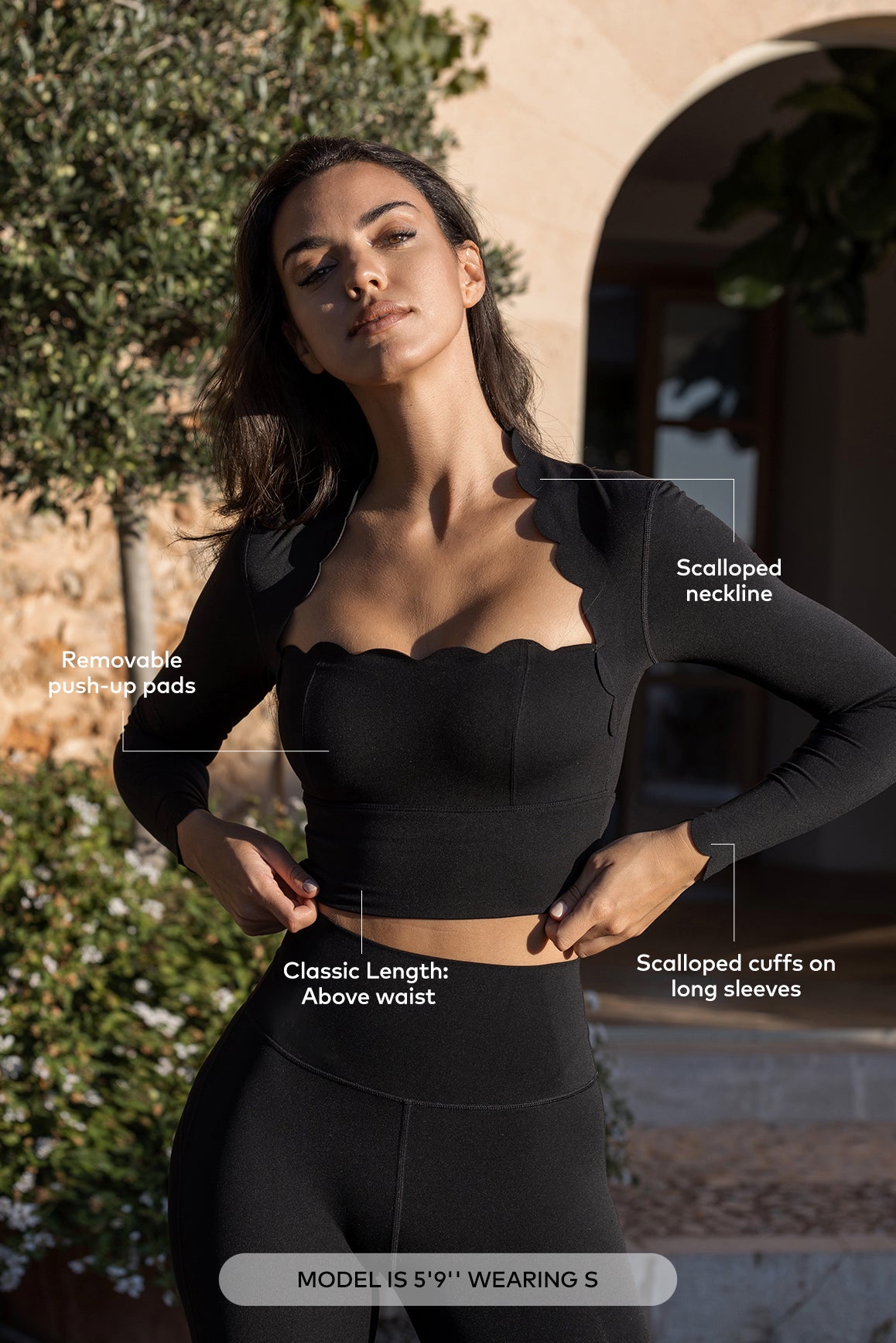 WISKII scallop cropped long sleeve top in soft fabric with a stylish scalloped hem and fitted design.