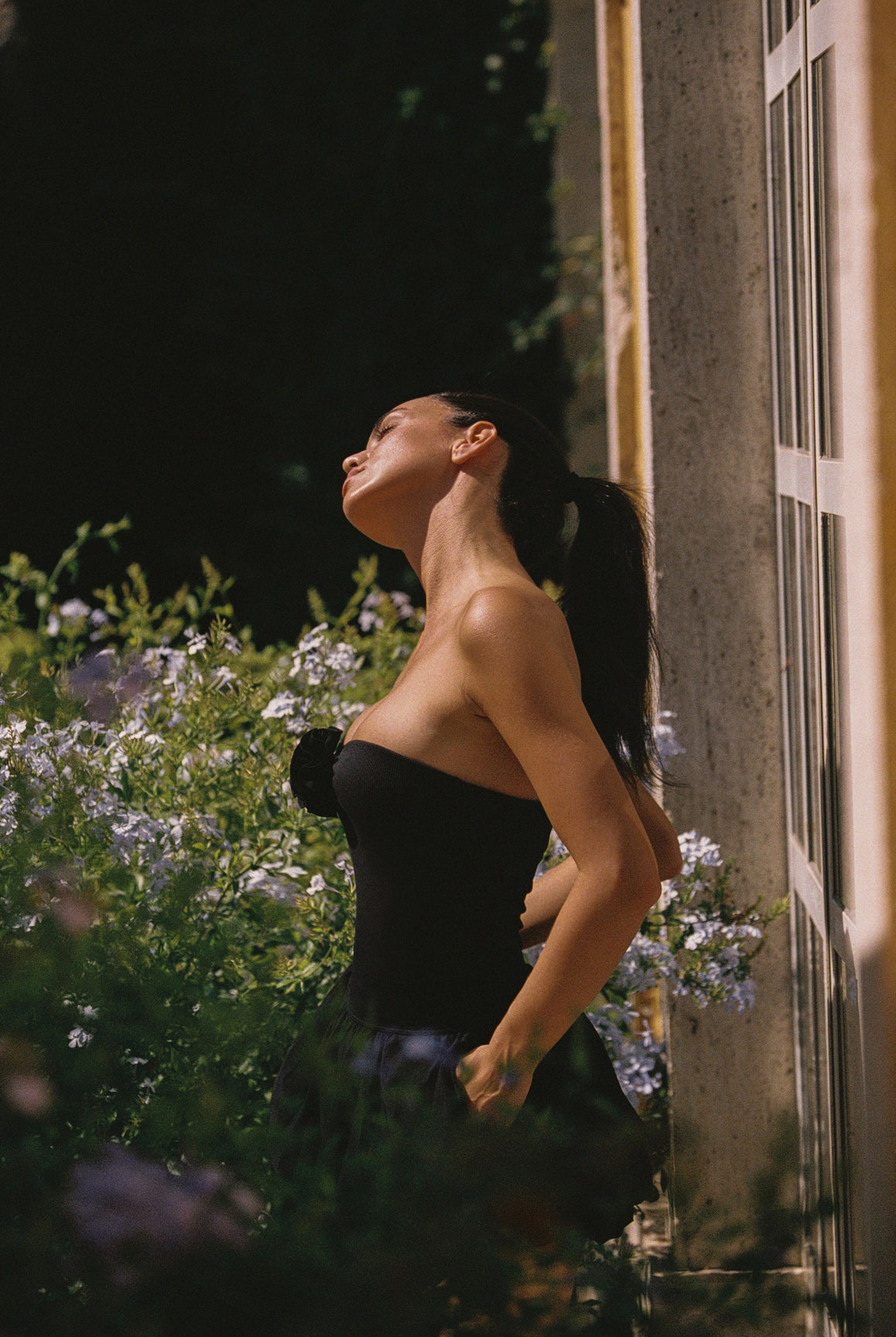 Model wears WISKII Strapless Floral Tank Top | black tank top | WISKII Active