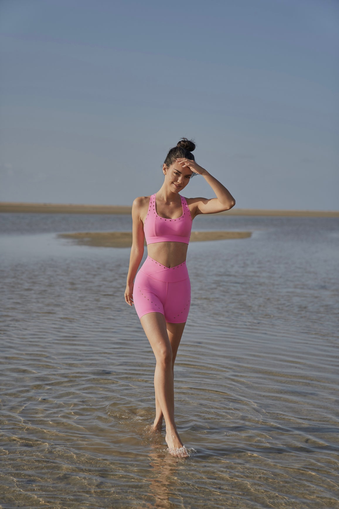 Model wears WISKII V-waist Laser Cut Sports Short