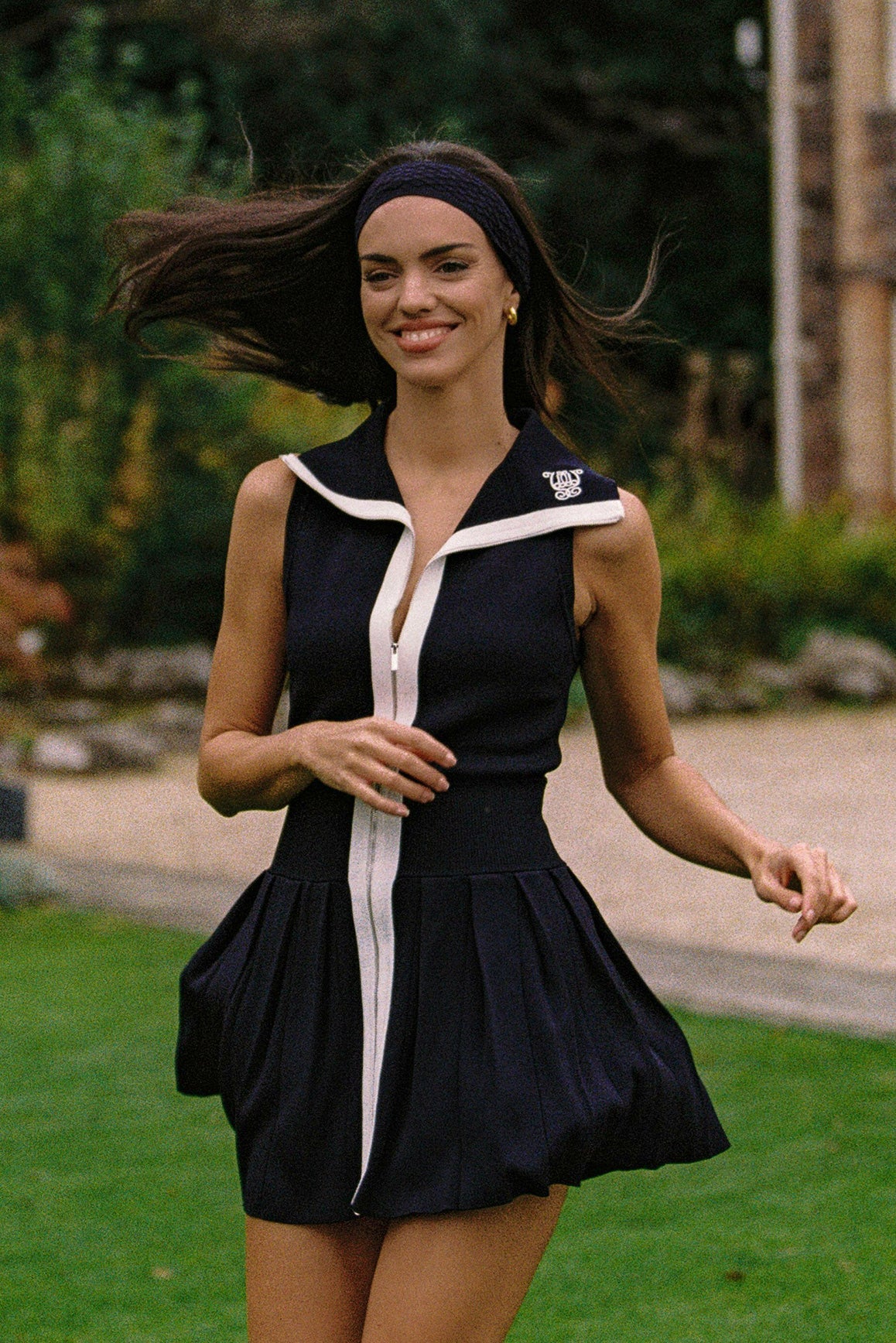 WISKII full-zip sleeveless dress featuring a sleek design, fitted silhouette, and front zipper, perfect for casual or stylish wear.