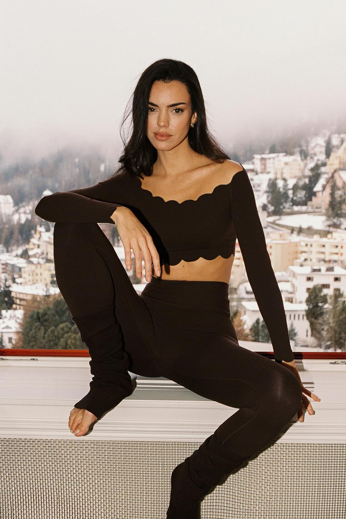 WISKII Studio Luxe Leg Warmers in soft, cozy fabric, worn as stylish accessories for a comfortable, fashionable look.