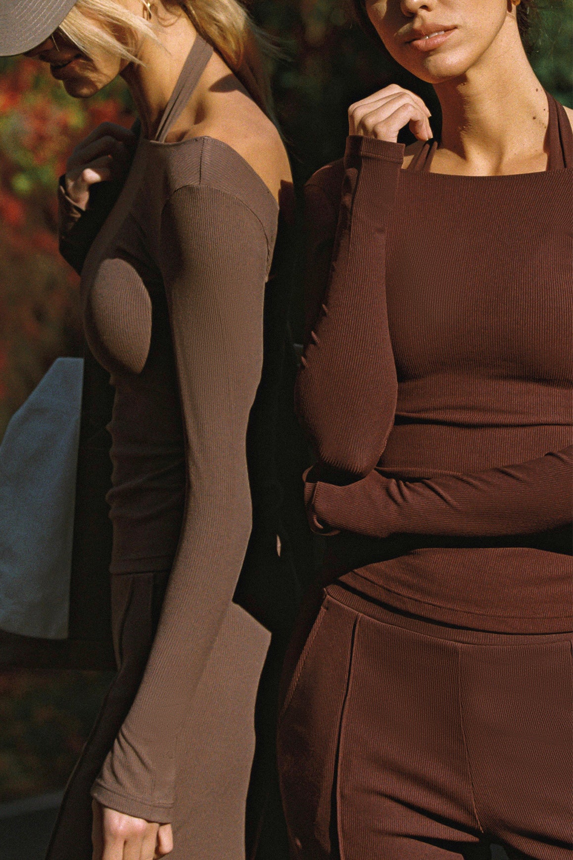 WISKII Duo Long Sleeve Top in black, featuring a fitted design with ribbed cuffs and neckline, perfect for casual wear.