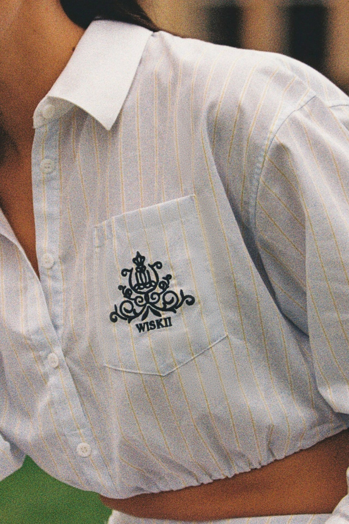 WISKII stripe button-down crop shirt featuring a stylish pattern, long sleeves, and a classic collar, perfect for casual wear.