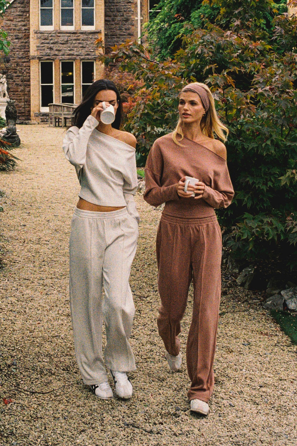 WISKII Ease Wide Leg Pants in soft fabric, featuring a relaxed fit and wide-leg silhouette, shown in a neutral color.