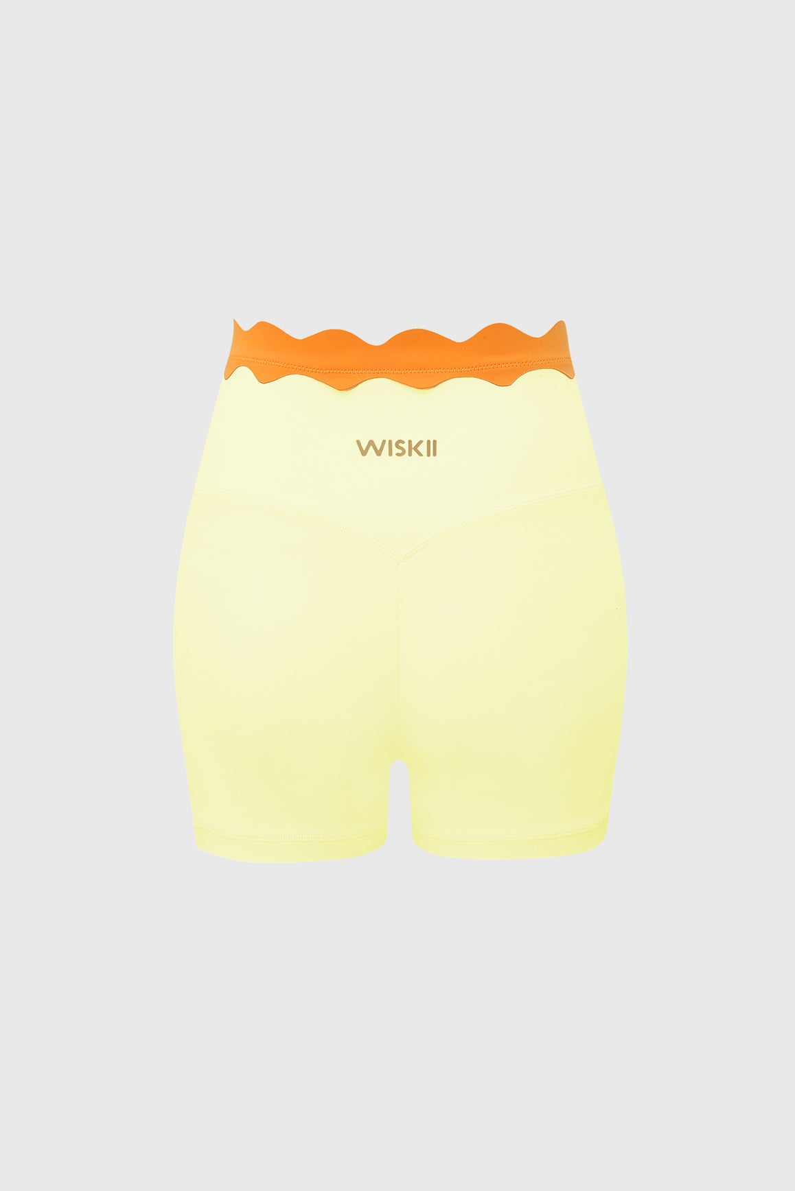 WISKII contrast scallop scrunch shorts with scalloped hem and fitted style, shown in a casual pose on model.