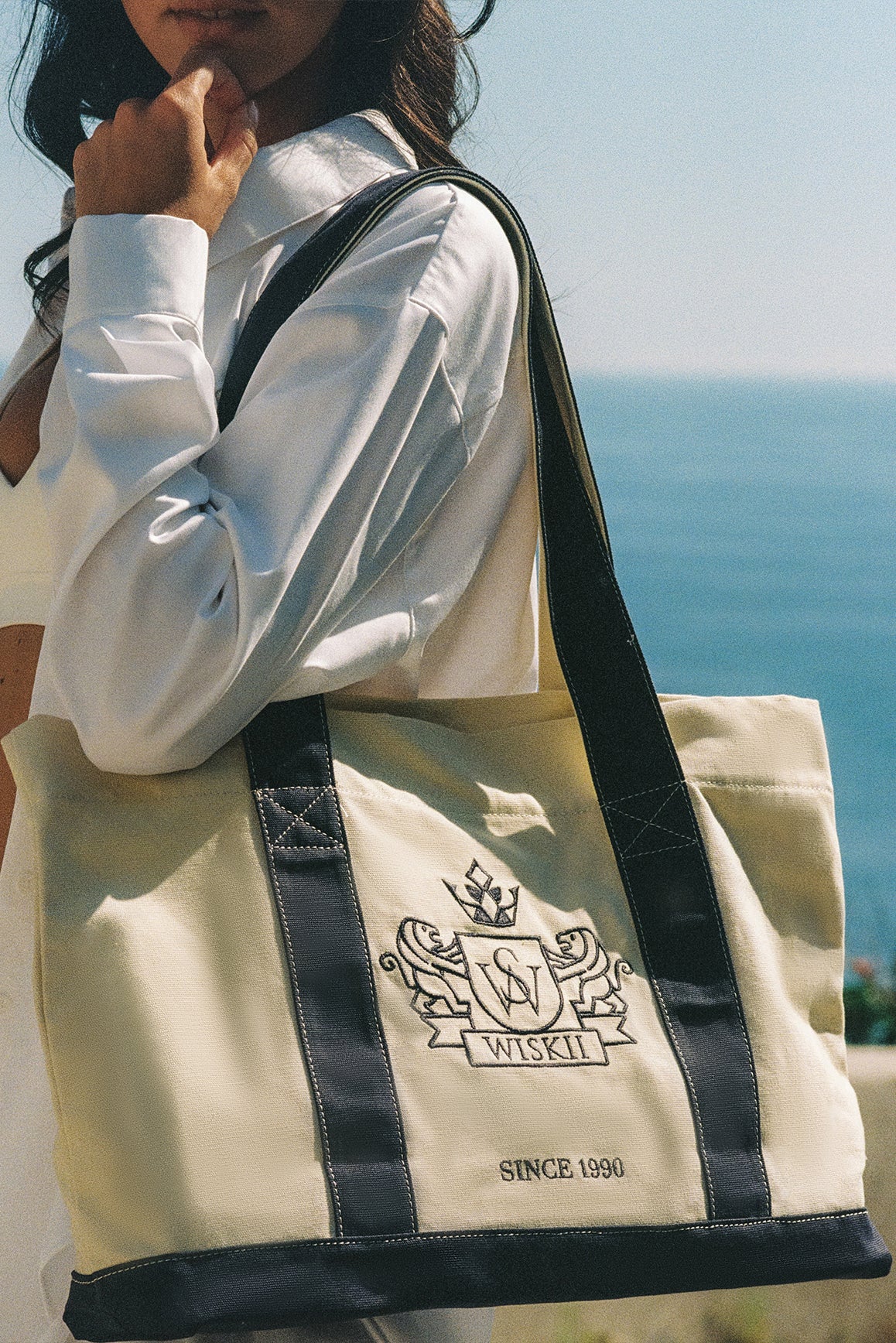 Midnight blue Riviera Canvas Club Tote Bag by WISKII, featuring spacious design and durable canvas material for everyday accessories.