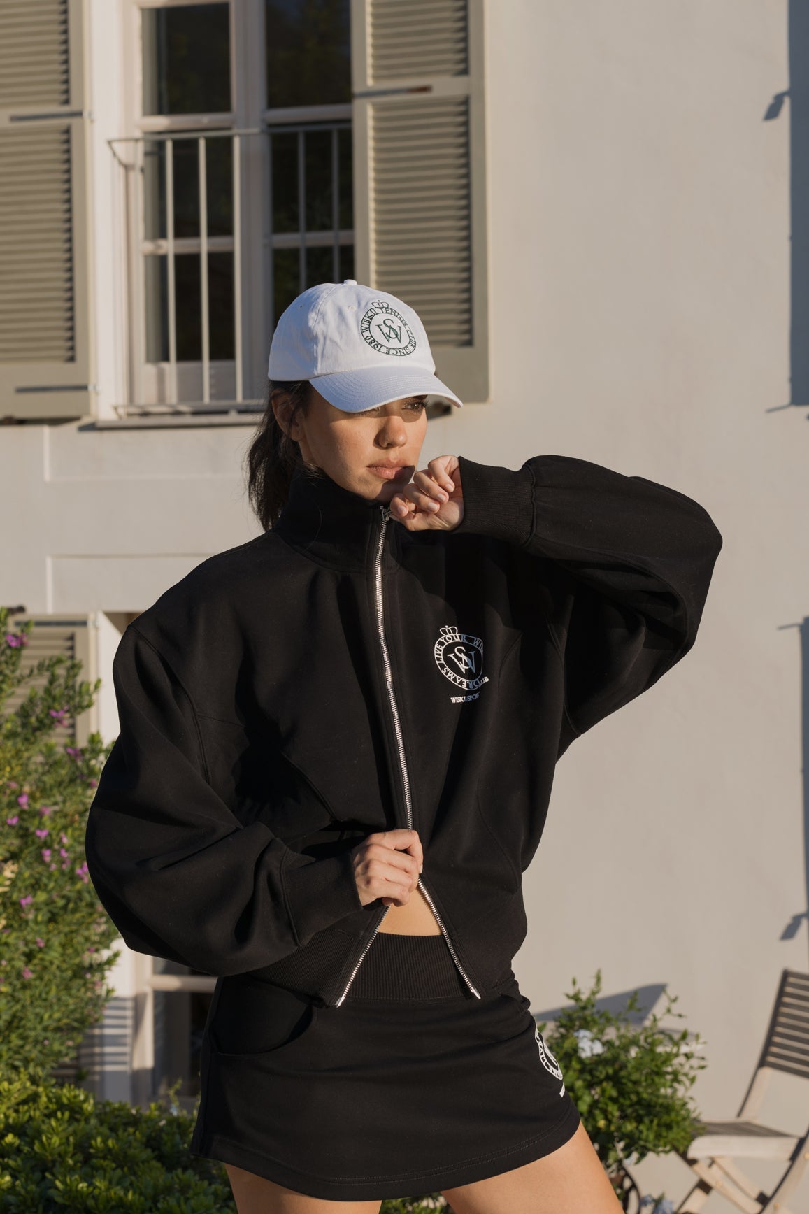 WISKII bundle with flame orange two-way zipper jacket and stylish mini sweat skirt, casual and trendy outfit for women.