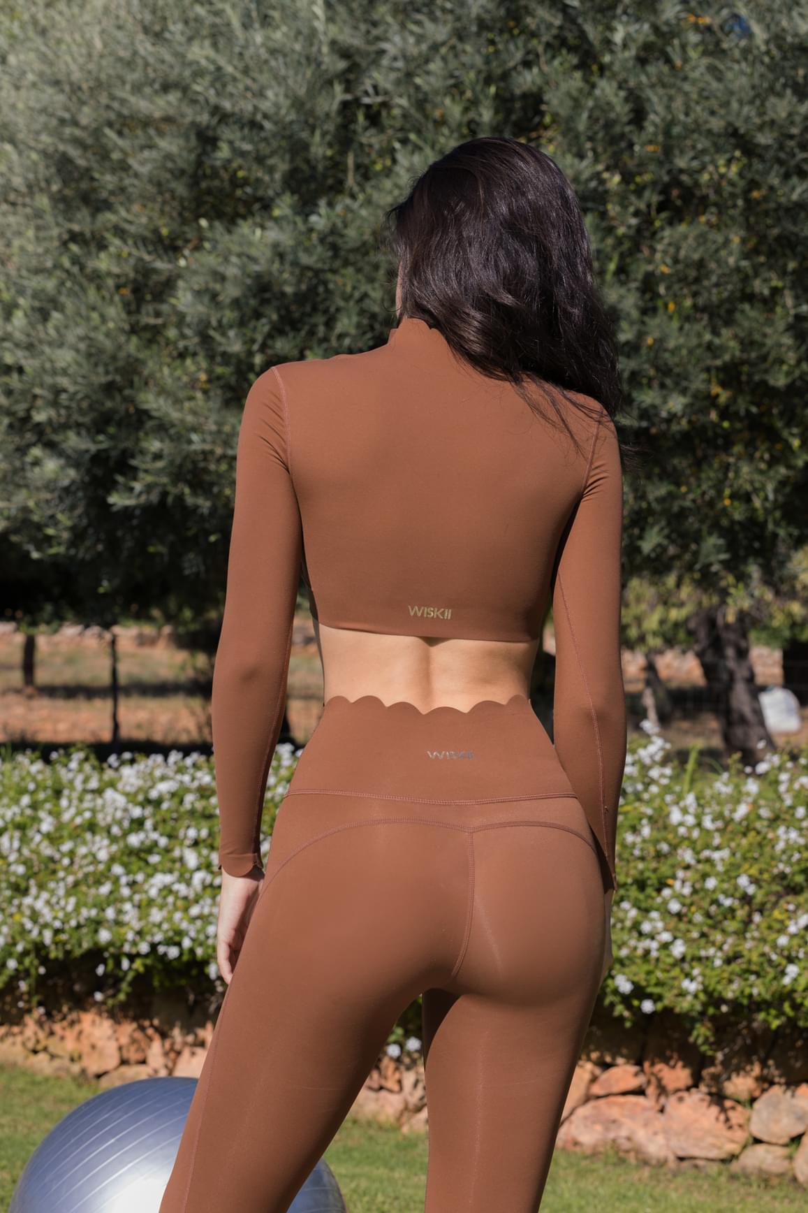 WISKII scallop cropped long sleeve top in Sakura Zen color, featuring a mini length and scallop details, stylish crop top design.