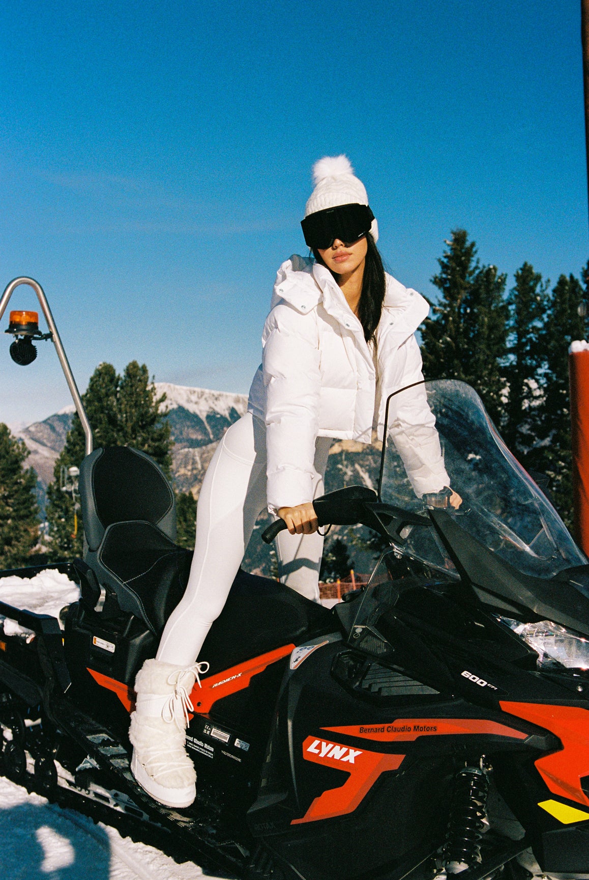 Ivory long sleeve half-zip full length unitard by WISKII, showcasing sleek design and comfortable fit.