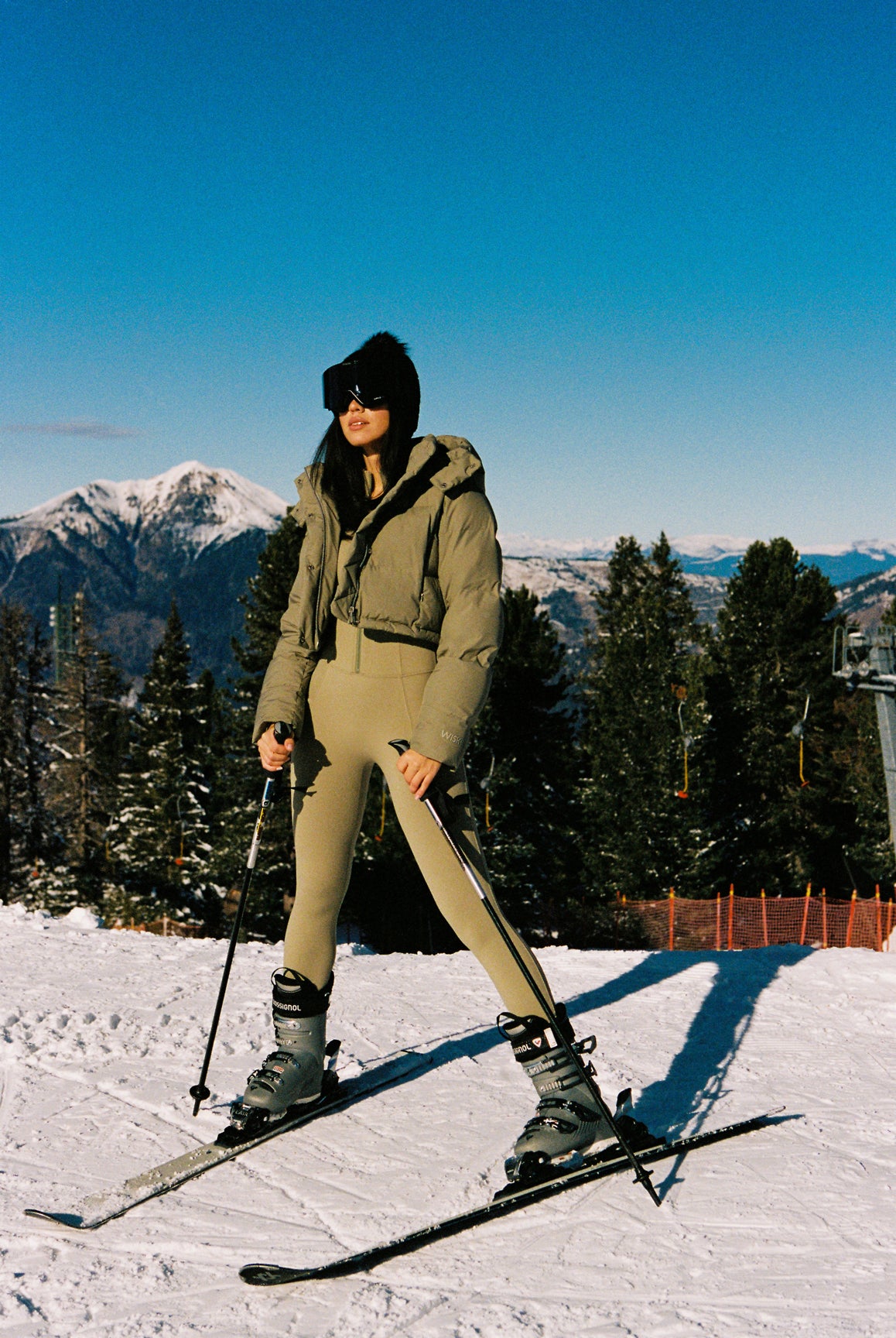 WISKII long sleeve half-zip full length unitard in a sleek design, showcasing fabric texture and fit.