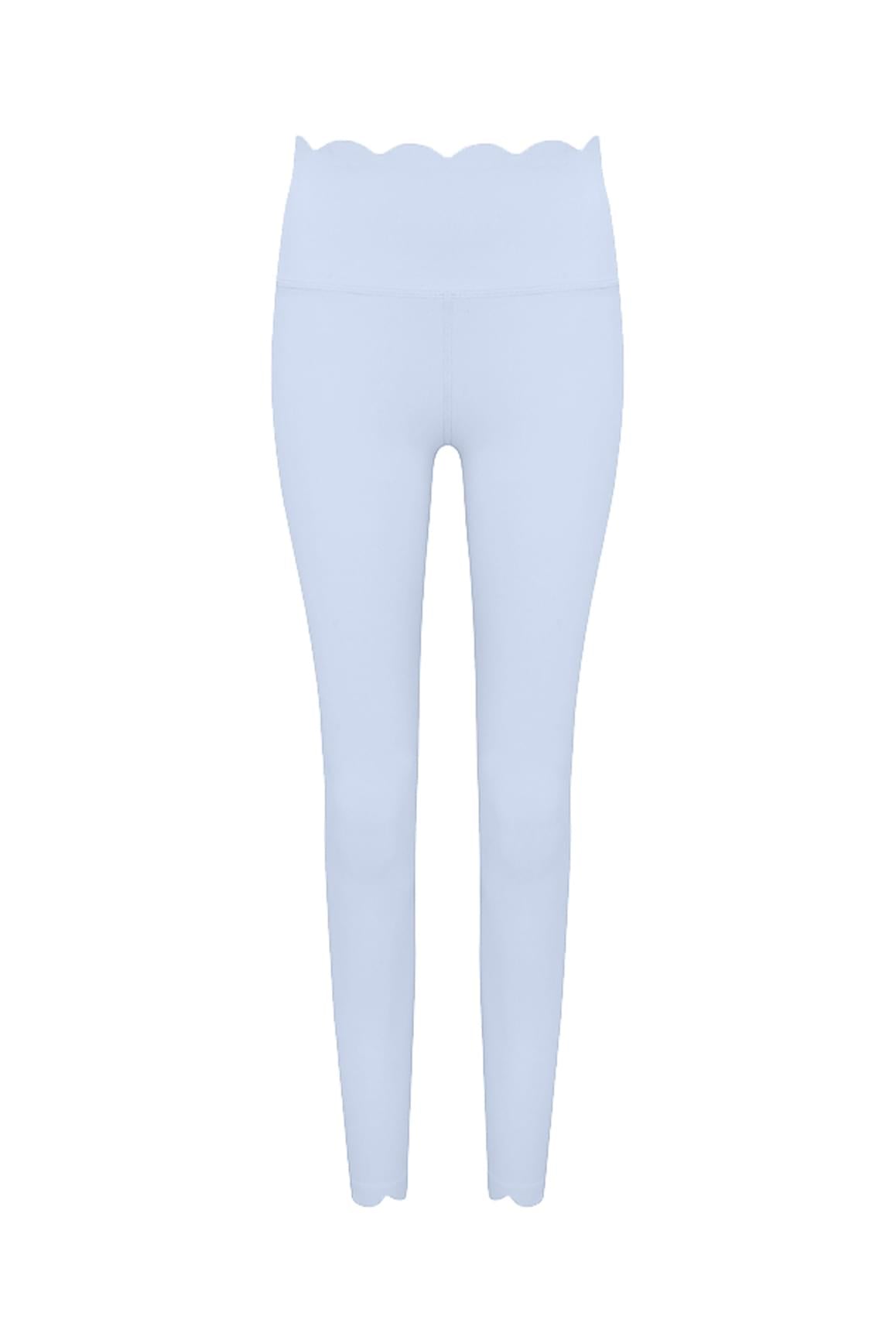 Ivory WISKII 7/8 High-Waist Energy Leggings shown on a model, highlighting their sleek fit and high waistband design.