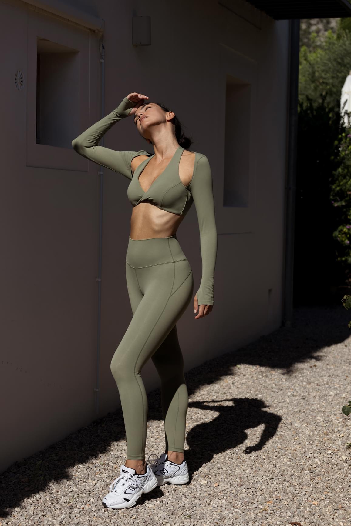 Ivory high-waist training leggings by WISKII, featuring a snug fit and seamless design for comfortable active wear.