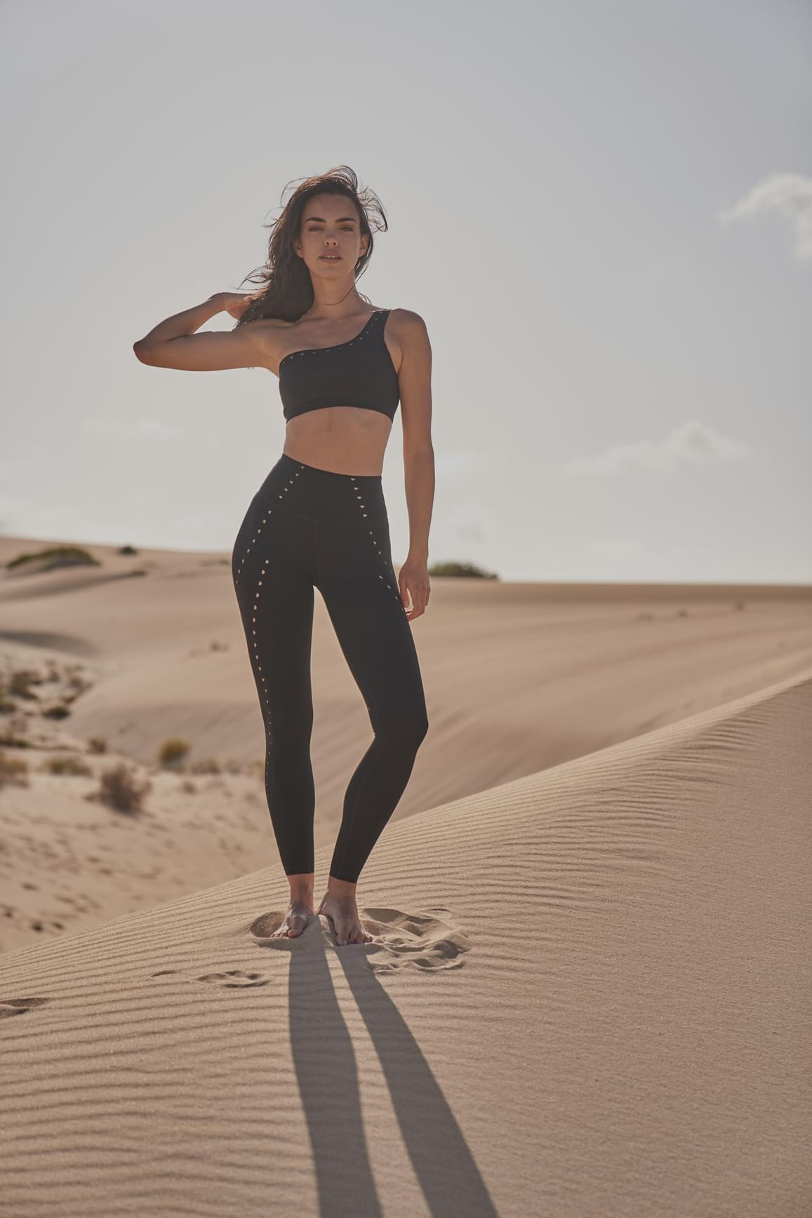 Ivory WISKII Training Laser Cut Leggings with stylish laser cut details and a comfortable fit for active wear.