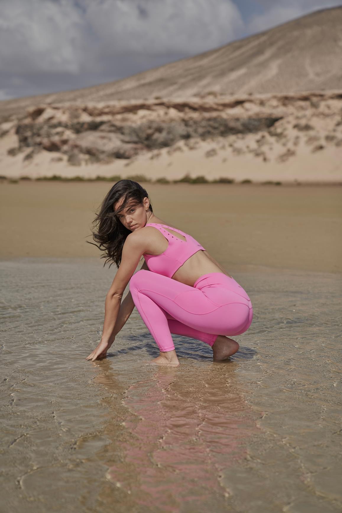 Ivory V-Waist Utility Leggings by WISKII featuring a high V-shaped waist and sleek, fitted design for active wear.