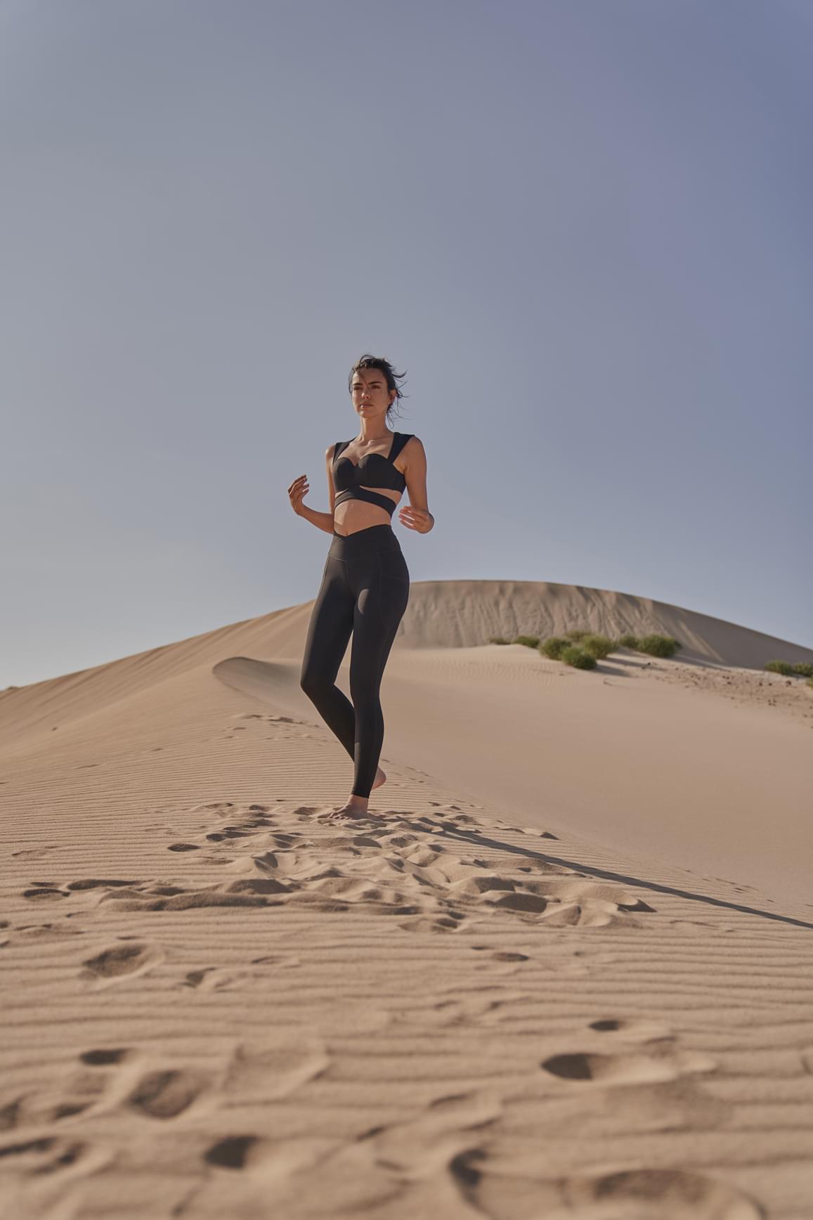 Ivory V-Waist Utility Leggings by WISKII, high-waisted leggings with functional design and stretch fabric for active wear.