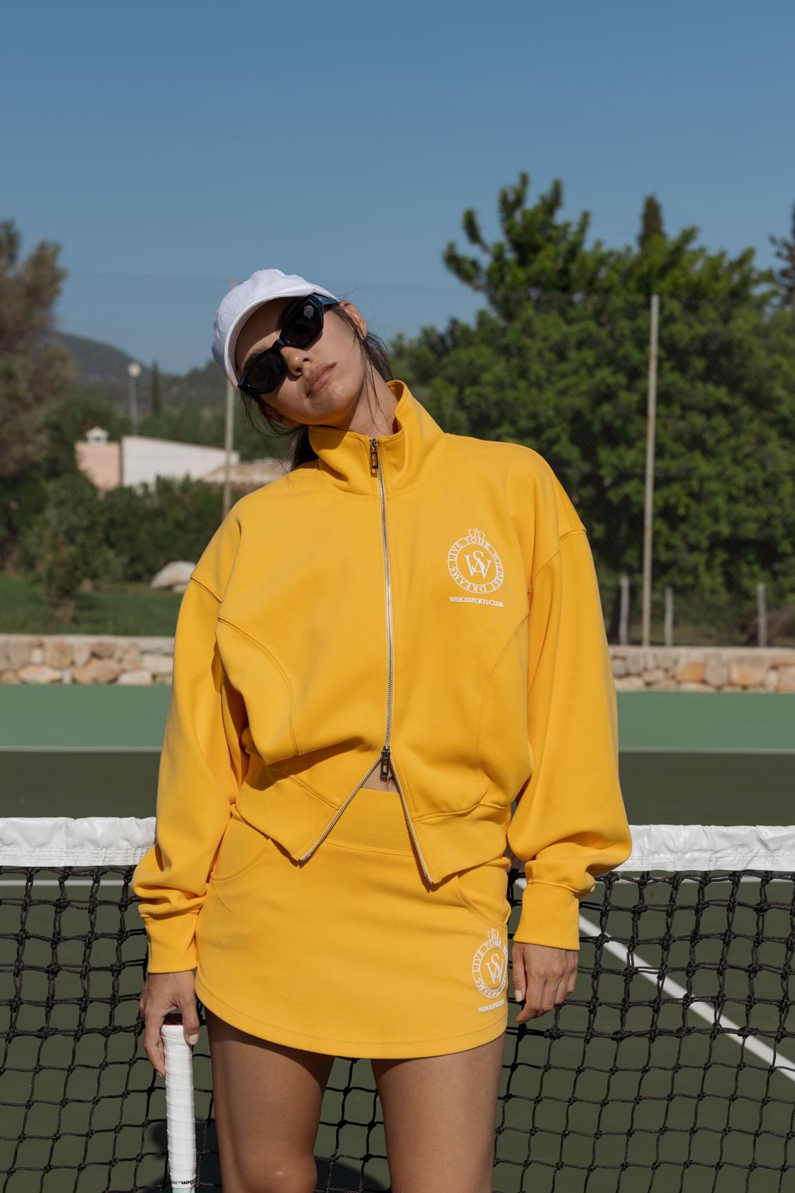 WISKII Two-Way Zipper Loungewear Jacket in oat milk color, front view showing the two-way zipper and comfortable fit.