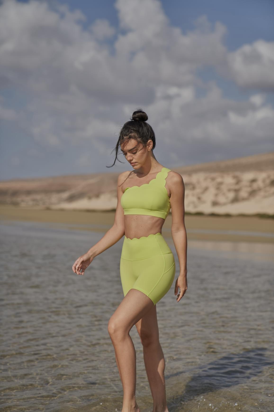 Ivory high-waist sculpting biker shorts by WISKII, featuring a snug fit and stretch fabric for a flattering silhouette.