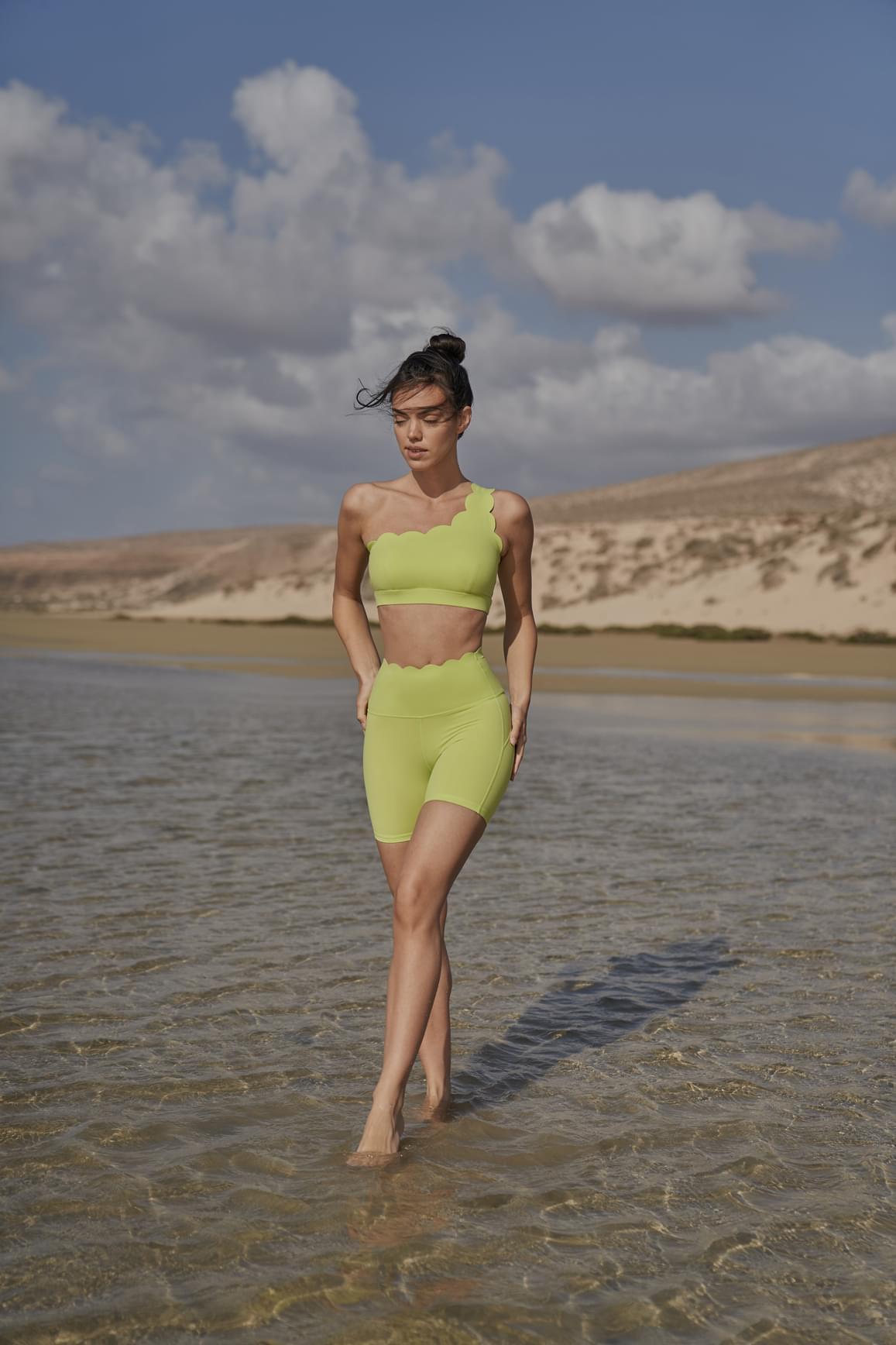 Ivory high-waist sculpting biker shorts by WISKII, featuring a snug fit and seamless design for a flattering shape.