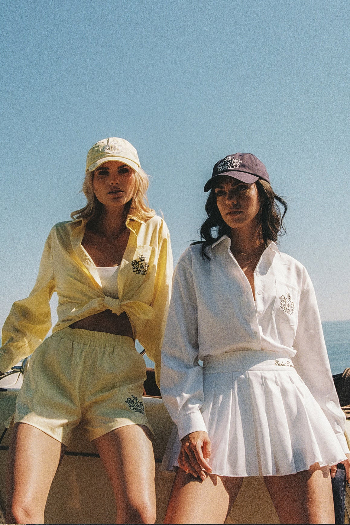 WISKII Riviera pleated skirt in high-waist cotton fabric, shown in a summer cloud color with a flowing, stylish design.