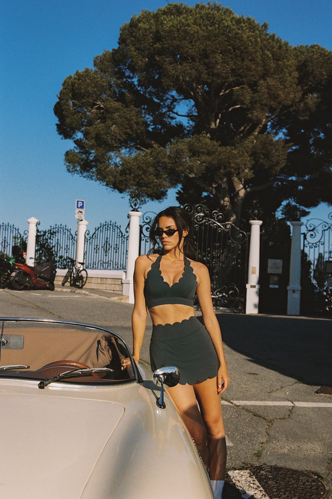 Model wears a High-Waist Scallop Split Front Skirt | WISKII Active | Deepsea Skirt