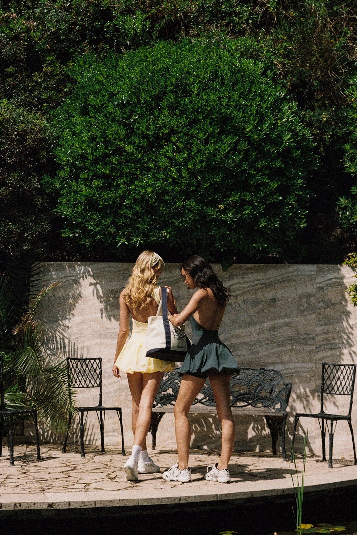 WISKII mini bubble skirt in a vibrant color, featuring a flared silhouette and textured fabric detail.