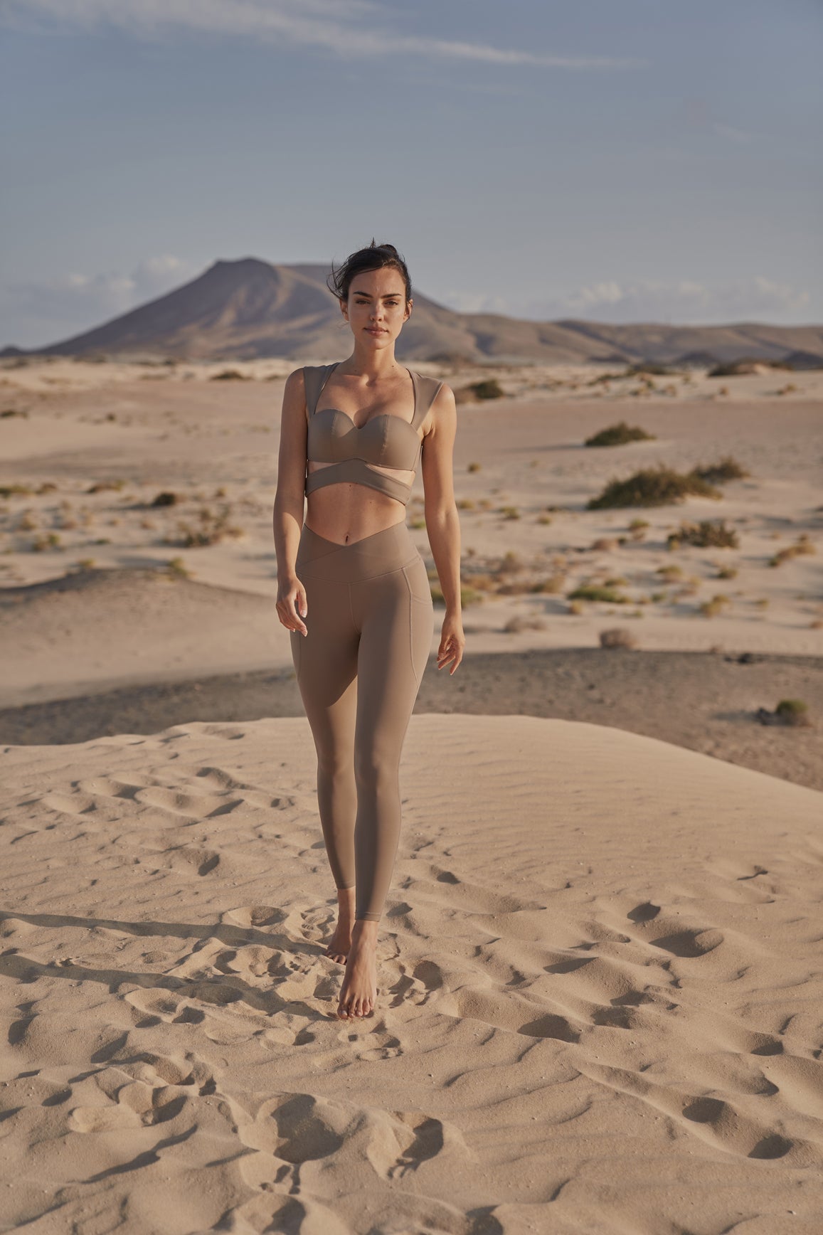 WISKII Elegant Corset Sports Bra in almond butter color, supportive athletic sports bra with a stylish corset design.