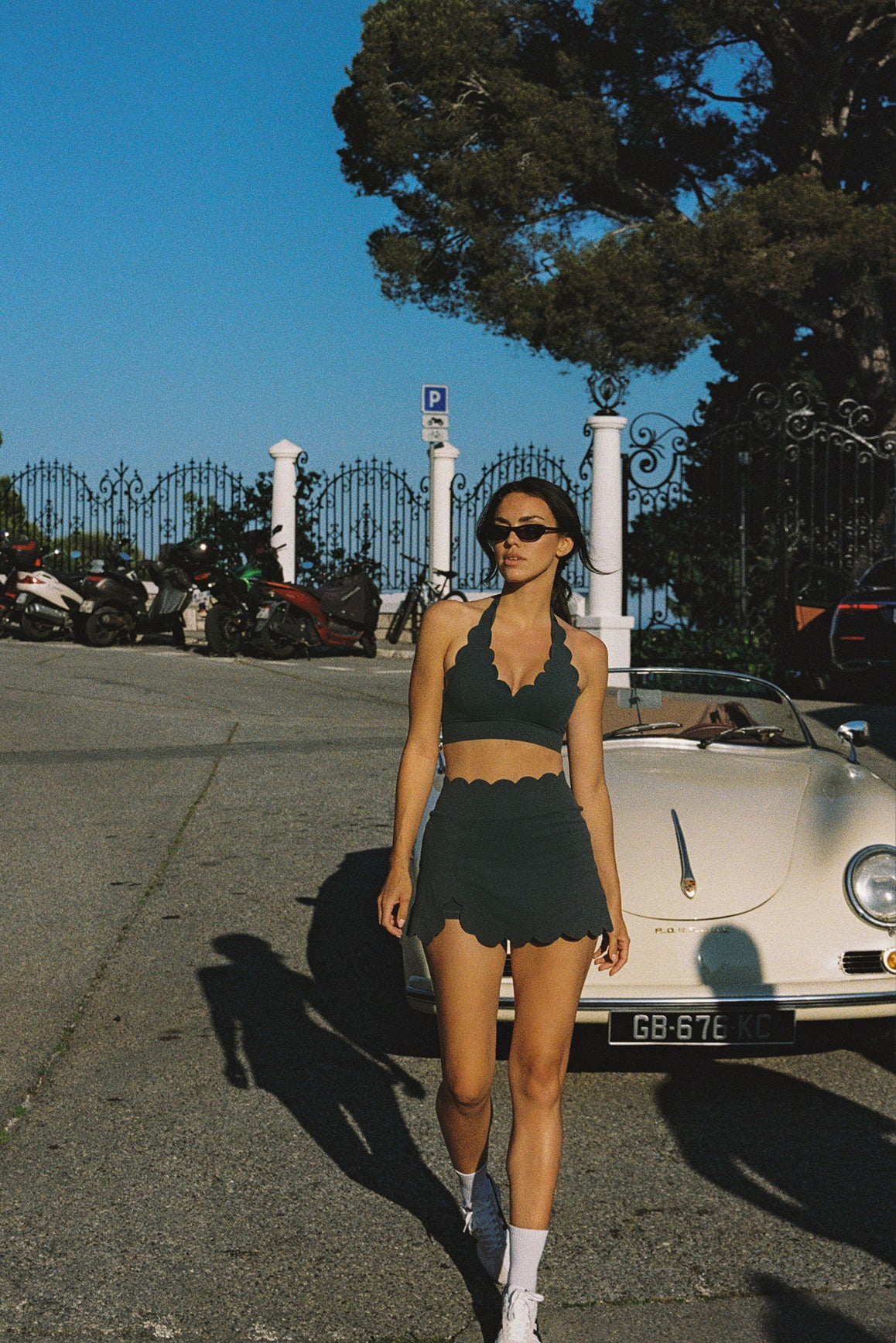 WISKII V-Cut Scallop Halter Bra in black, showcasing its unique scalloped design and halter neck style.