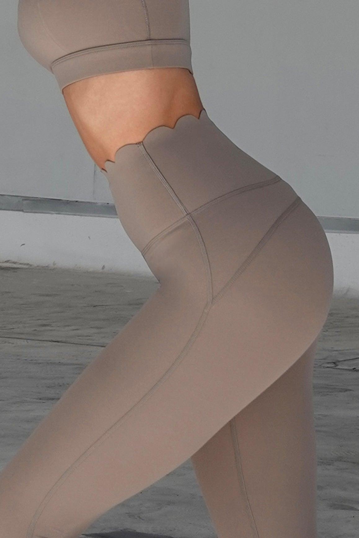 Ivory 7/8 high-waist energy leggings by WISKII, showcasing a snug fit and comfortable stretch for active wear.
