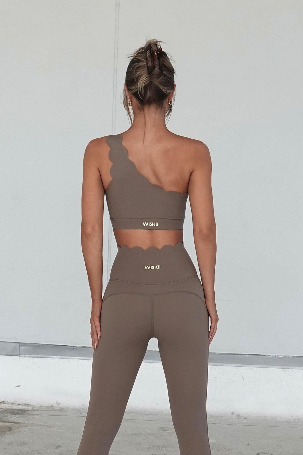 Ivory 7/8 high-waist energy leggings by WISKII, fitted activewear with a comfortable high-rise waistband and stretchy fabric.