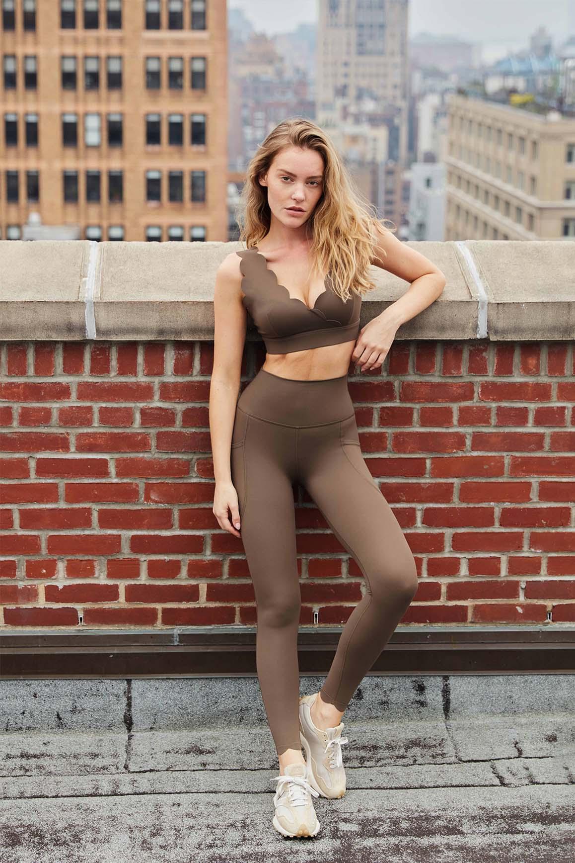 WISKII Soufflé Sports Bra in ivory, lightweight and supportive athletic bra with a sleek design for active wear.