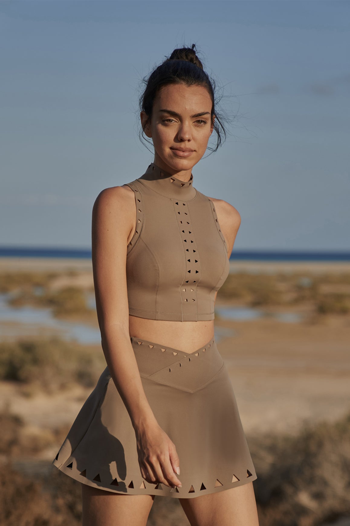 Model wears WISKII V-waist Laser Cut Tennis Skirt