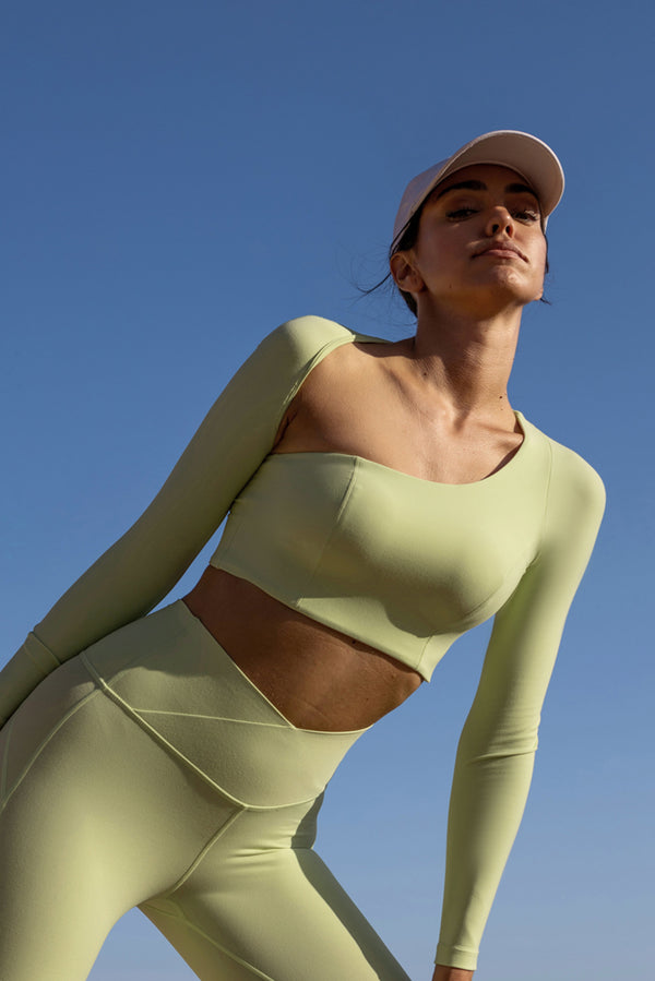 Model wears Unique Cut Long Sleeve Crop Top | WISKII ACTIVE