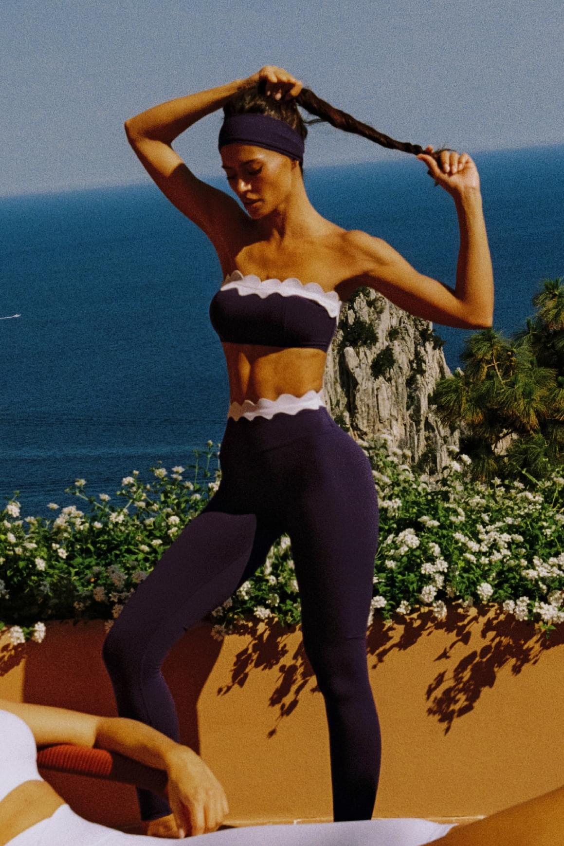 WISKII scallop contrast scrunch leggings featuring a fitted design with scallop edges and contrasting panels.