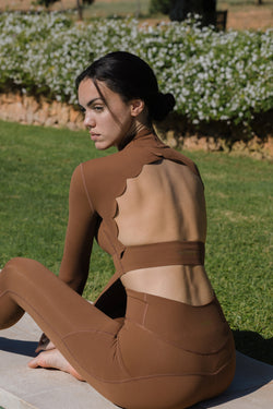Model wears Open Back Long Sleeve Crop Top | WISKII