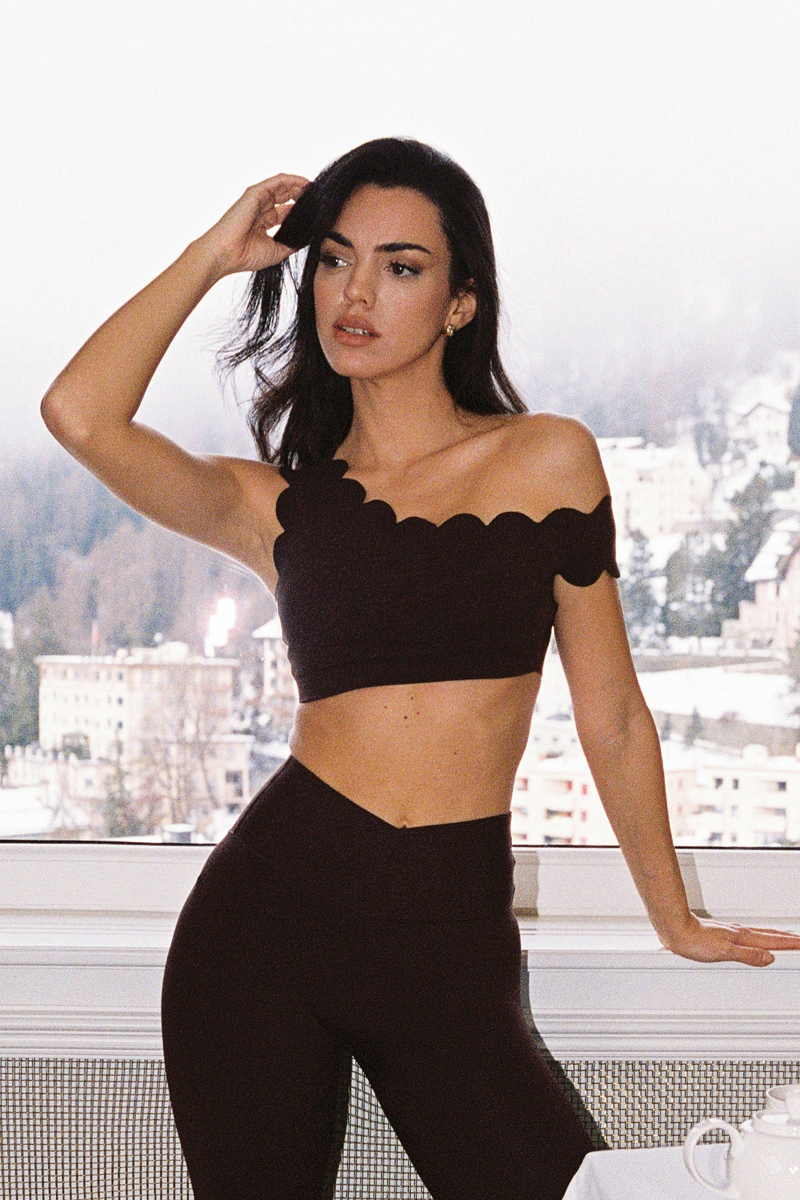 WISKII asymmetric off-shoulder scalloped sports bra with stylish design and comfortable fit, ideal for active wear.