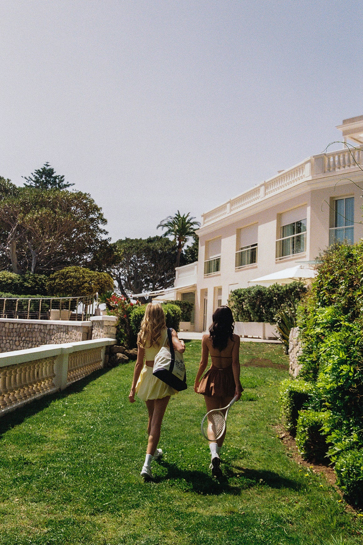 Model wears a Riviera Floral Ruched Bra | WISKII Active | Lemon Drop