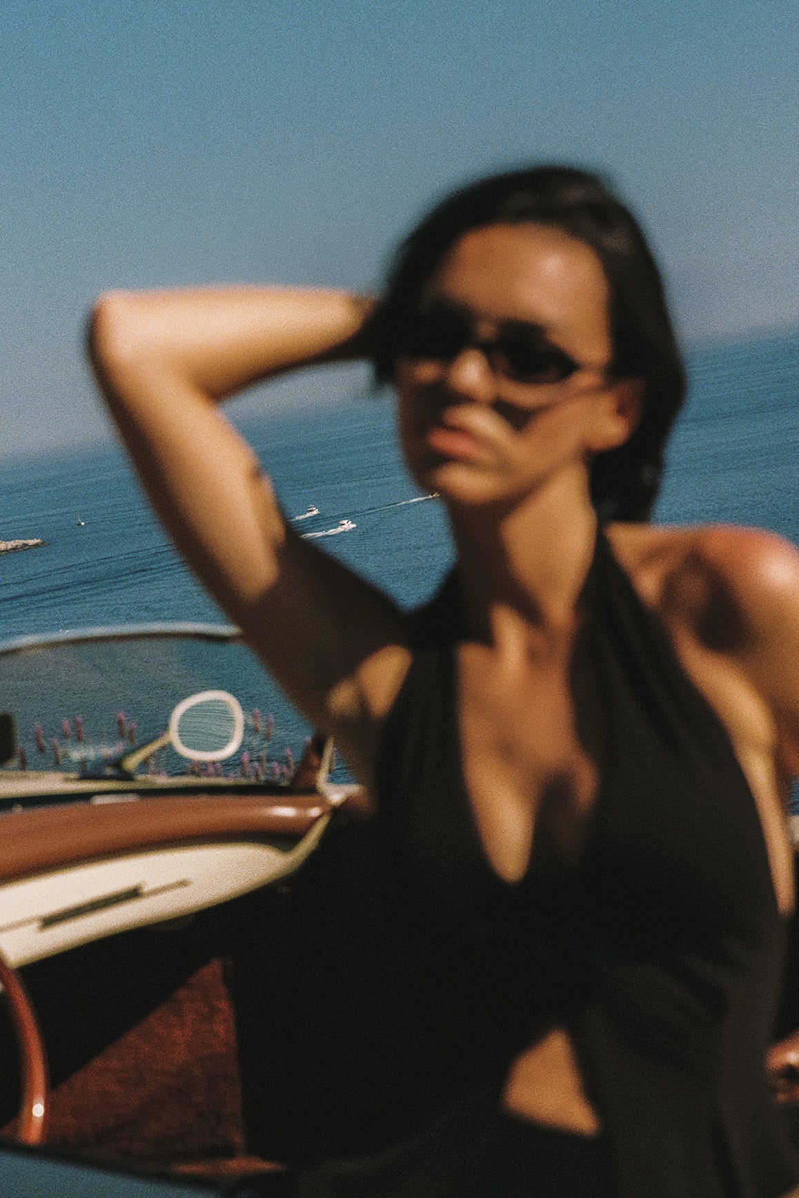 Model wears a Riviera Floral Halter Vest | Black | WISKII Active