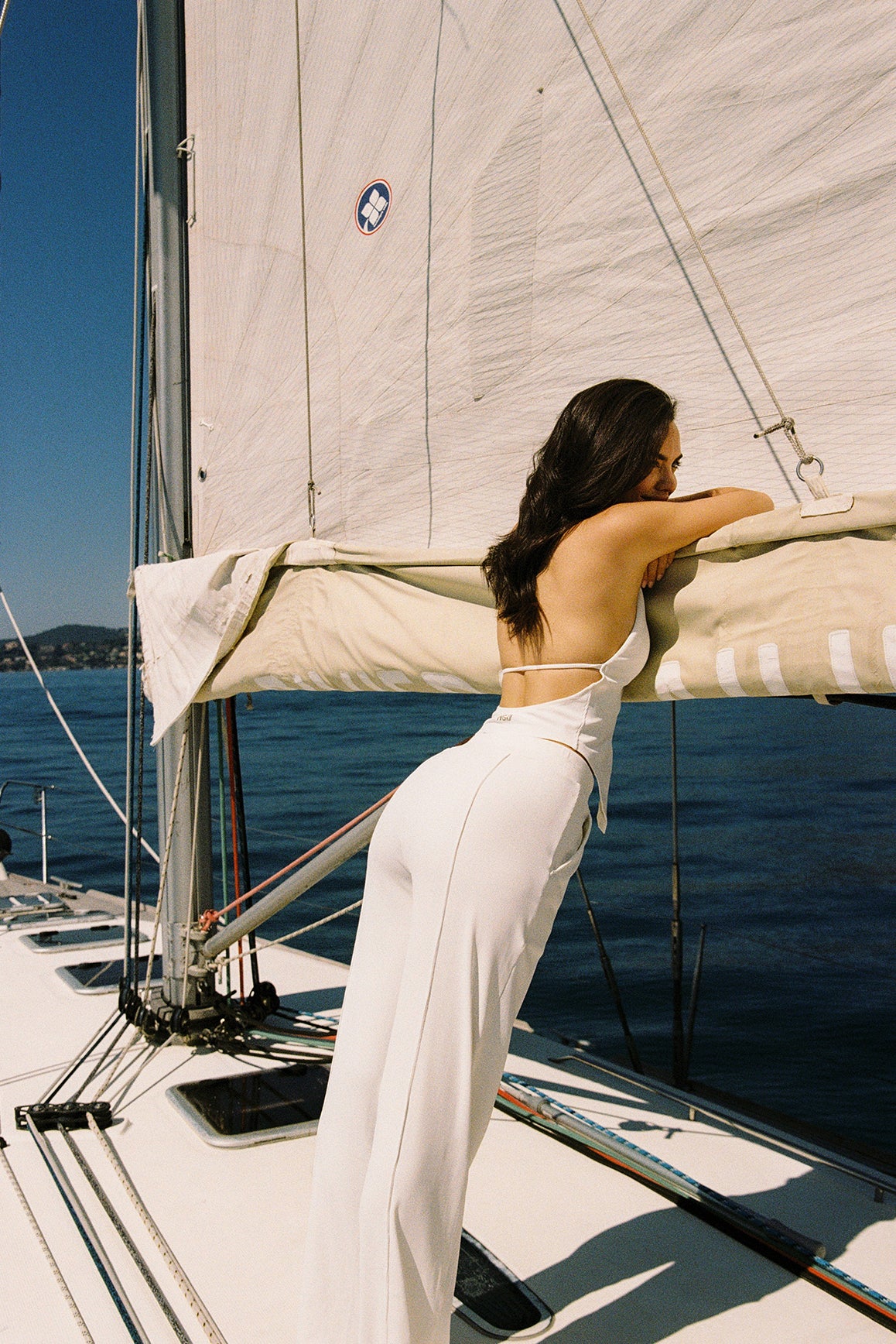 Model wears a Riviera Floral Halter Vest | Ivory Vest  | WISKII Active