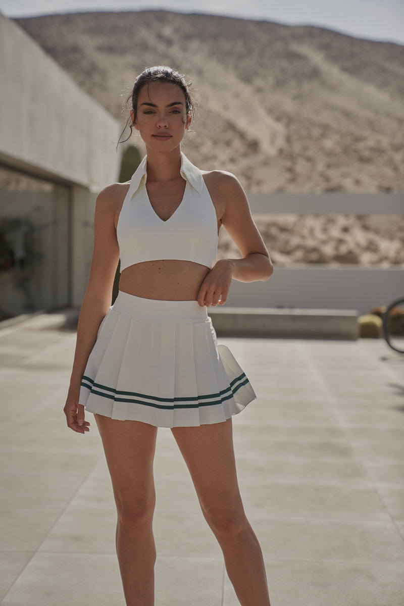 Model wears WISKII Varsity Tennis Skirt