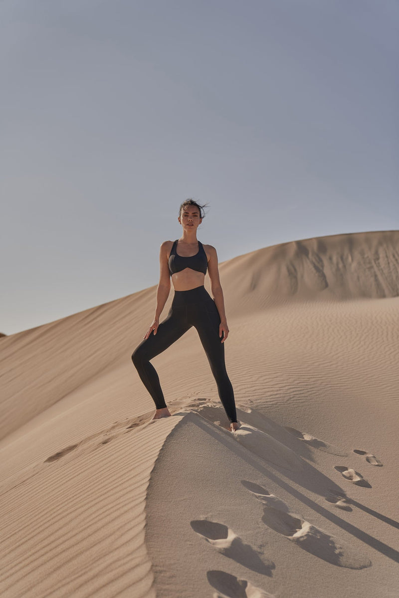 Model wears Dreamy Cutout Yoga Bra + High-Waist Invigorate Legging | WISKII