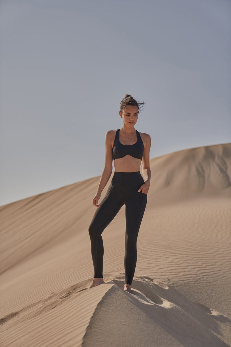 Model wears WISKII Dreamy Cutout Yoga Bra