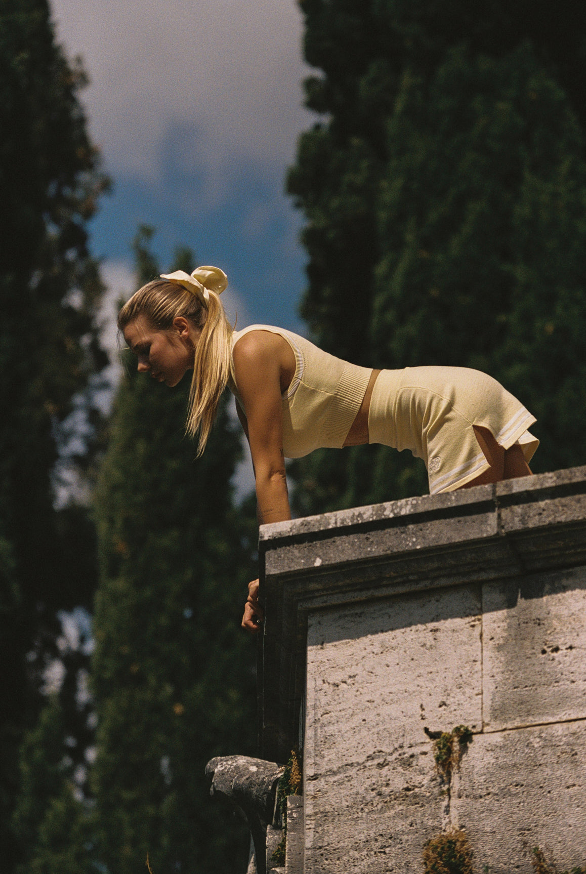 Model wears Mirto Knit Mock Neck Tank | Lemon | WISKII Active