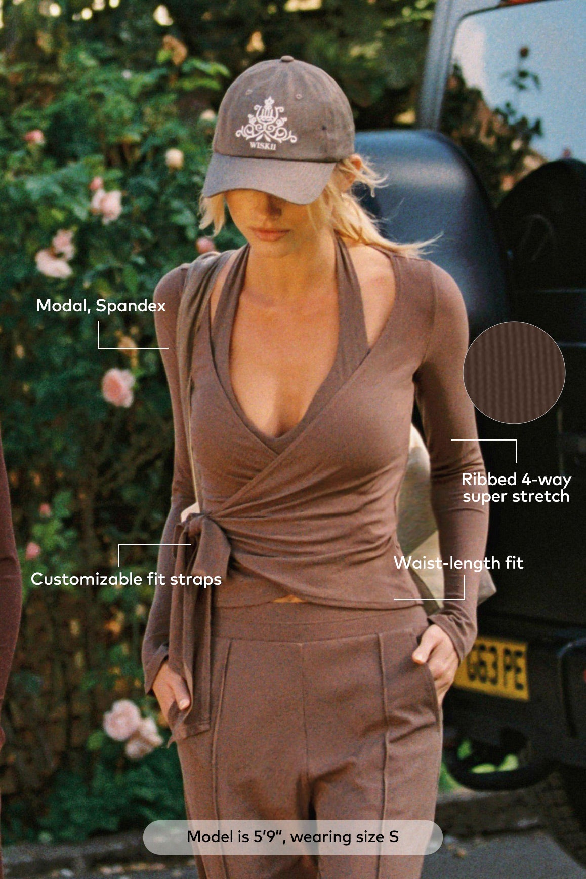 WISKII tie-front long sleeve top featuring a fitted design and stylish front knot, perfect for casual or chic outfits.