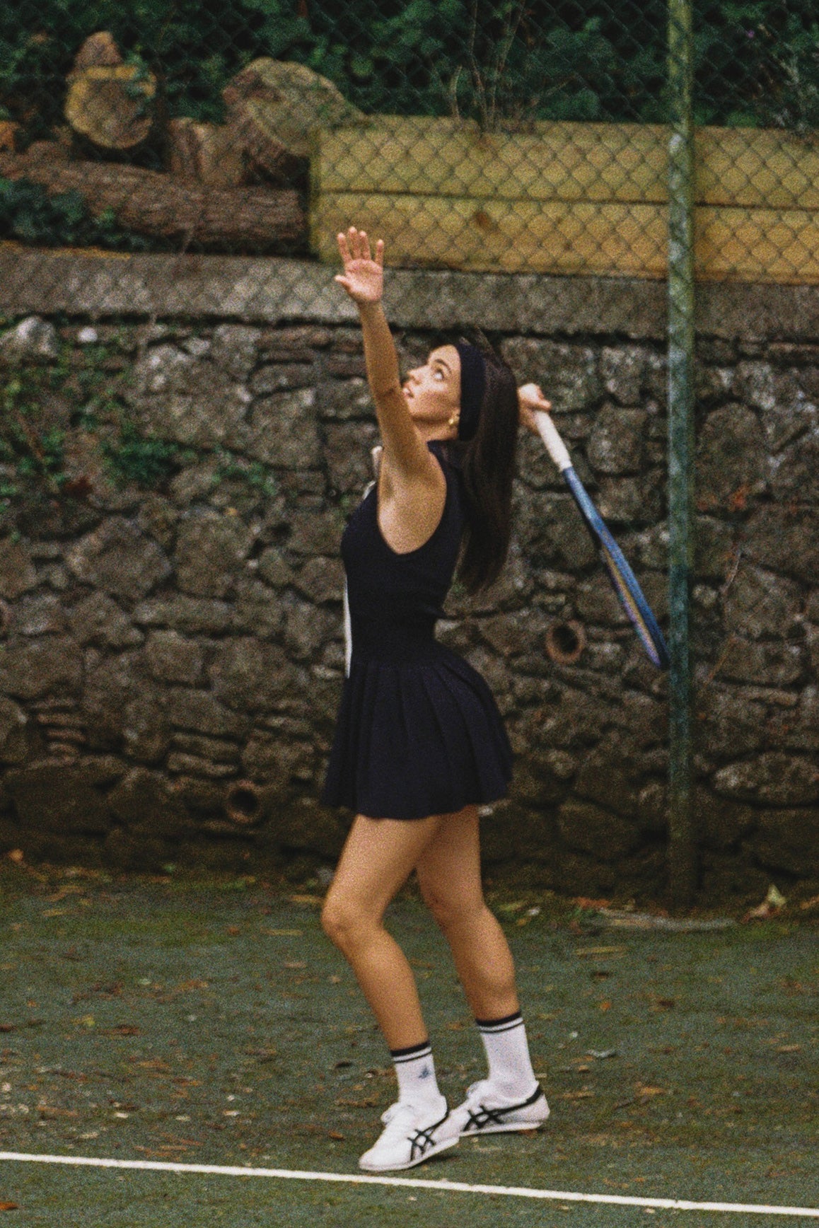 WISKII full-zip sleeveless dress in a sleek, modern design with a front zipper and fitted silhouette.