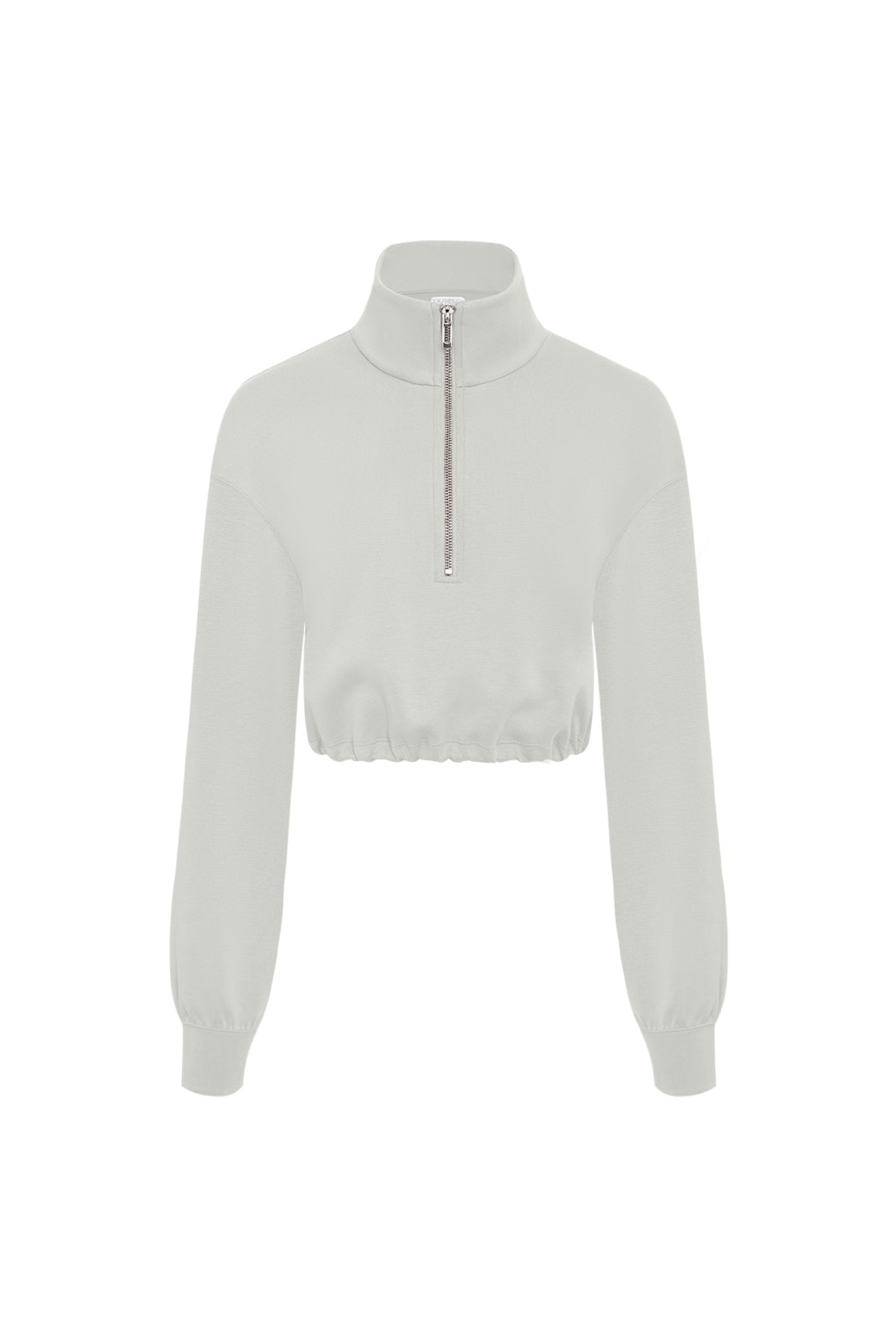 WISKII Serene cropped half-zip hoodie in soft dawn color, featuring a relaxed fit and stylish collar detail.