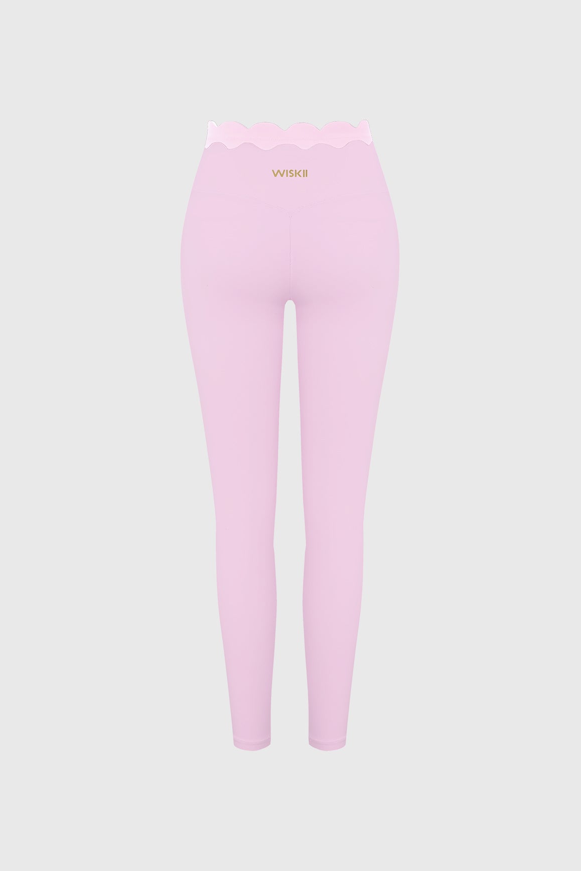 WISKII scallop contrast scrunch leggings showing the high-waisted design with scalloped and contrast detail in black and white fabric.
