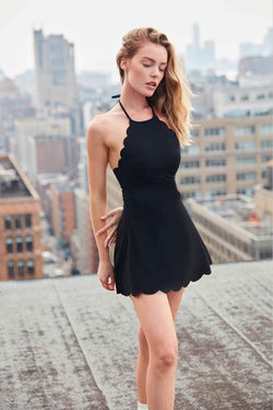 model wears WISKII Open Back Tennis Dress