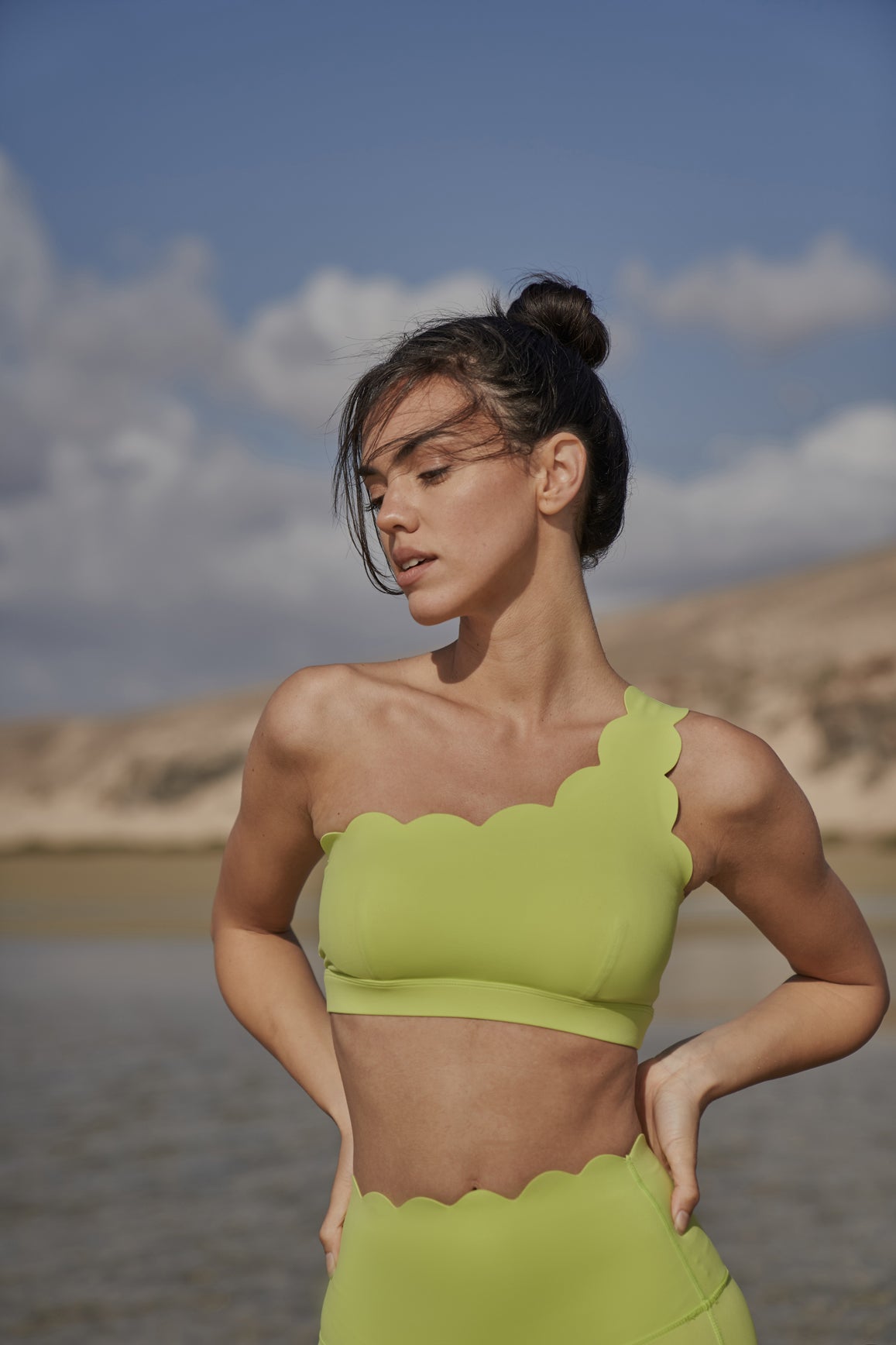 Model wears Dynamic One Shoulder Sports Bra + High-Waist Sculpting Biker Short | WISKII