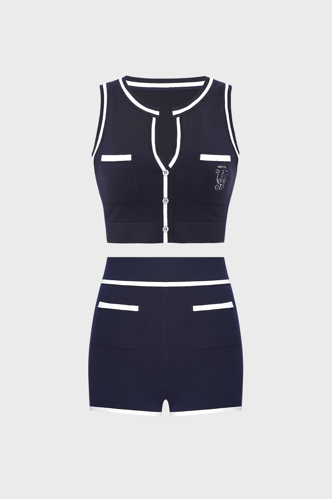 WISKII Mirto Knit lemon chiffon tank top and mini shorts bundle, featuring button details and a comfortable, stylish knit fabric.