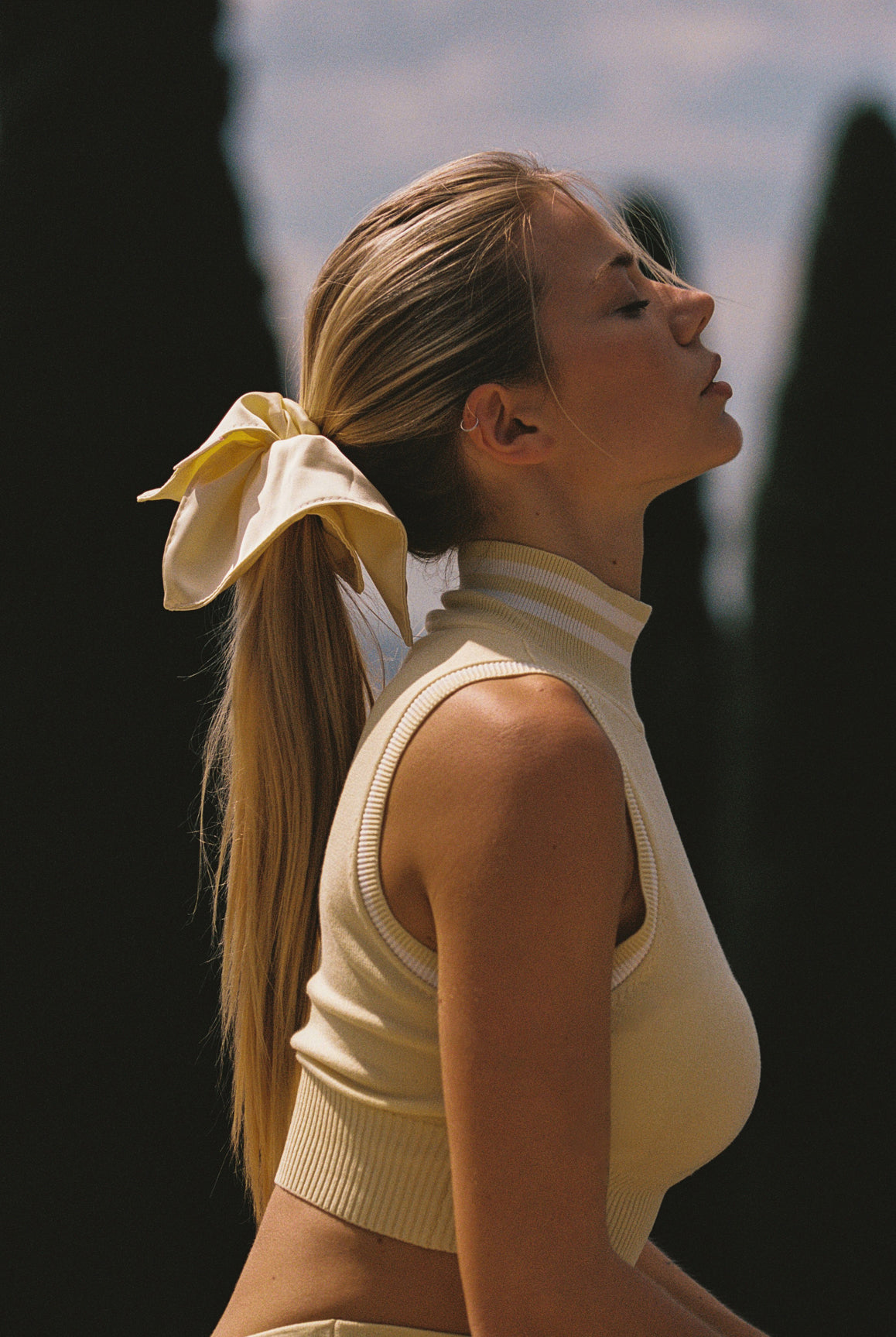 WISKII Mirto Knit Mock Neck Tank, lemon chiffon crop top with a mock neck and sleeveless design, casual and stylish for warm weather.